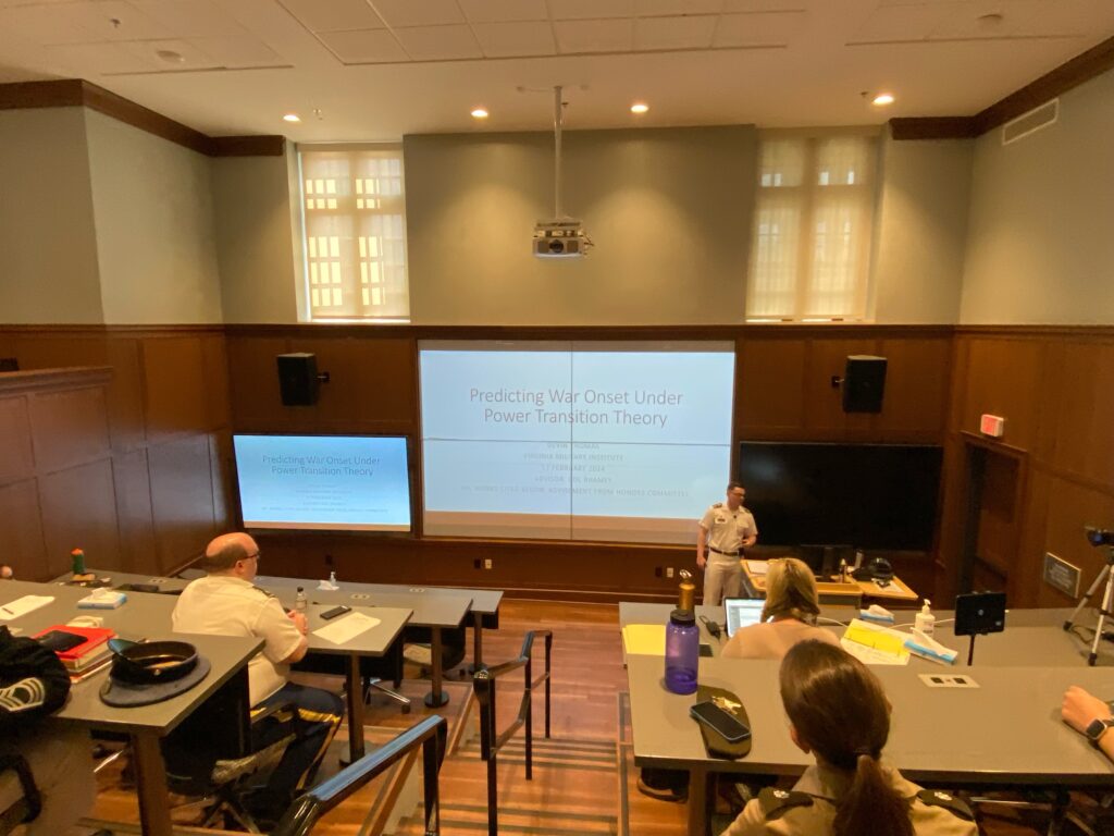 Cadet Devin Thomas '24 presenting his thesis on Predicting War Onset Under Power Transition Theory during Honors Week.
