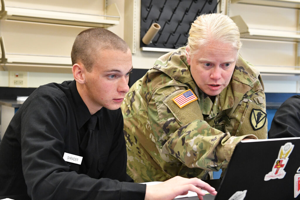 Maj. Molly Kent, assistant professor in the Department of Biology at Virginia Military Institute, working with a cadet.