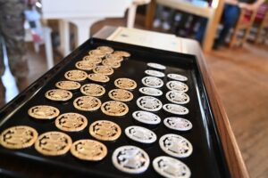 Badges laid out in display case before being handed out.