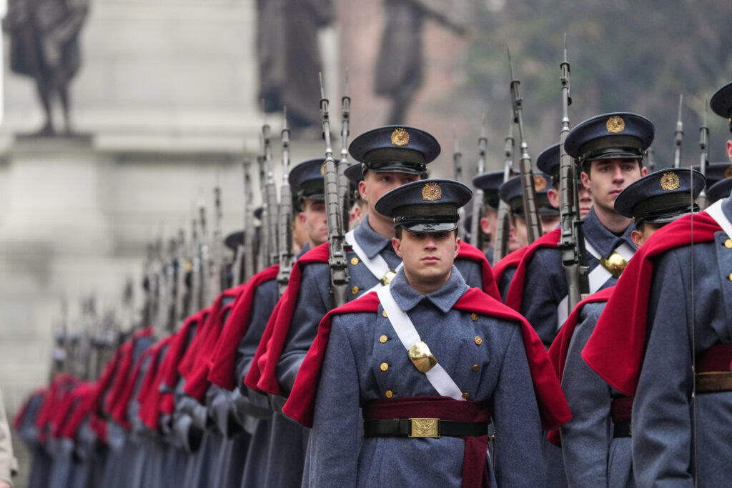 VMI cadets march in full uniform through the streets of Richmond, Virginia.