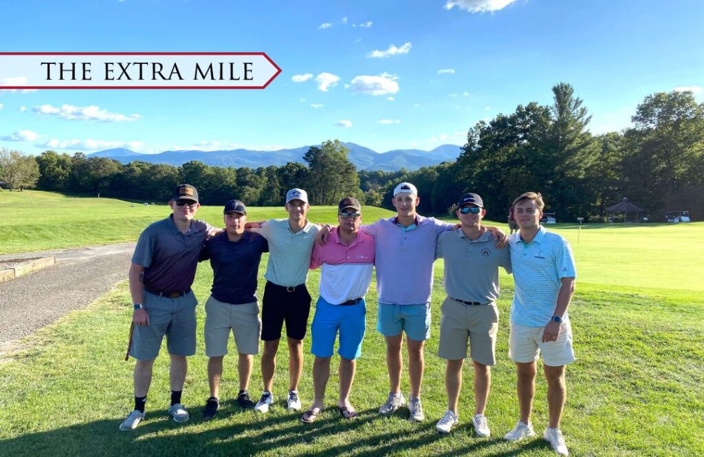 The VMI golf club on the green of a golf course.