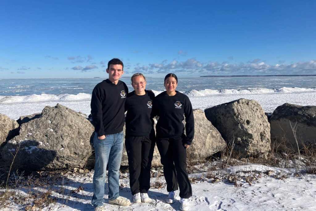 Cadets pose for a group photo in the snow at Lake Erie.