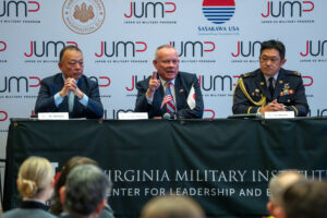 Three panelists speak to event attendees.