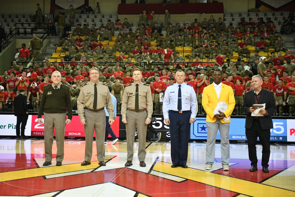 VMI faculty stands on the floor of Cameron Hall during recognition ceremony.