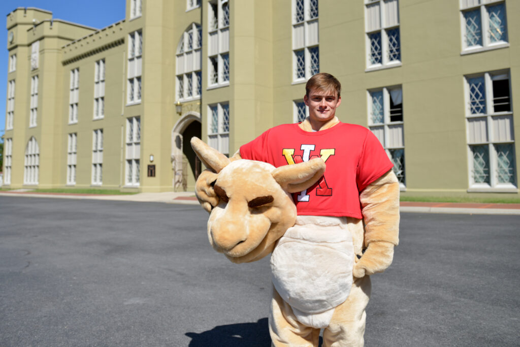 Bowlman “Tee” Bowles IV ’26 in the Moe costume outside of barracks.