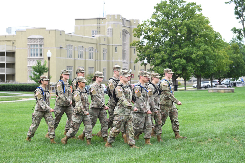 Cadets march along parade ground.