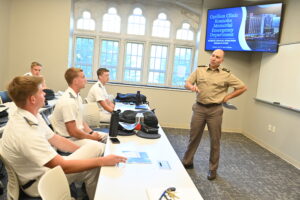 Cadets enrolled in the economics and business analytics class taught by Col. Barry Cobb, professor in the Department of Economics and Business, heard an award winning presentation by two juniors from Roanoke County’s Hidden Valley High School (HVHS).