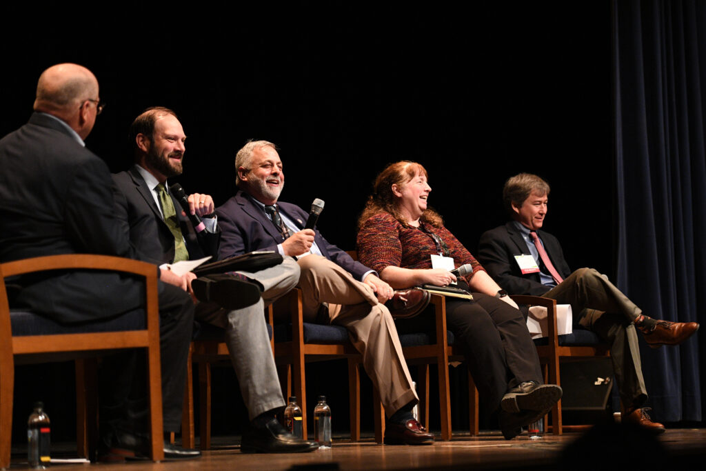 Keynote session moderator Roy Hoagland shares a light moment with state agency directors Matthew Wells (DCR), Mike Rolband (DEQ), Becky Gwynn (DWR), and Rob Farrell (DoF).