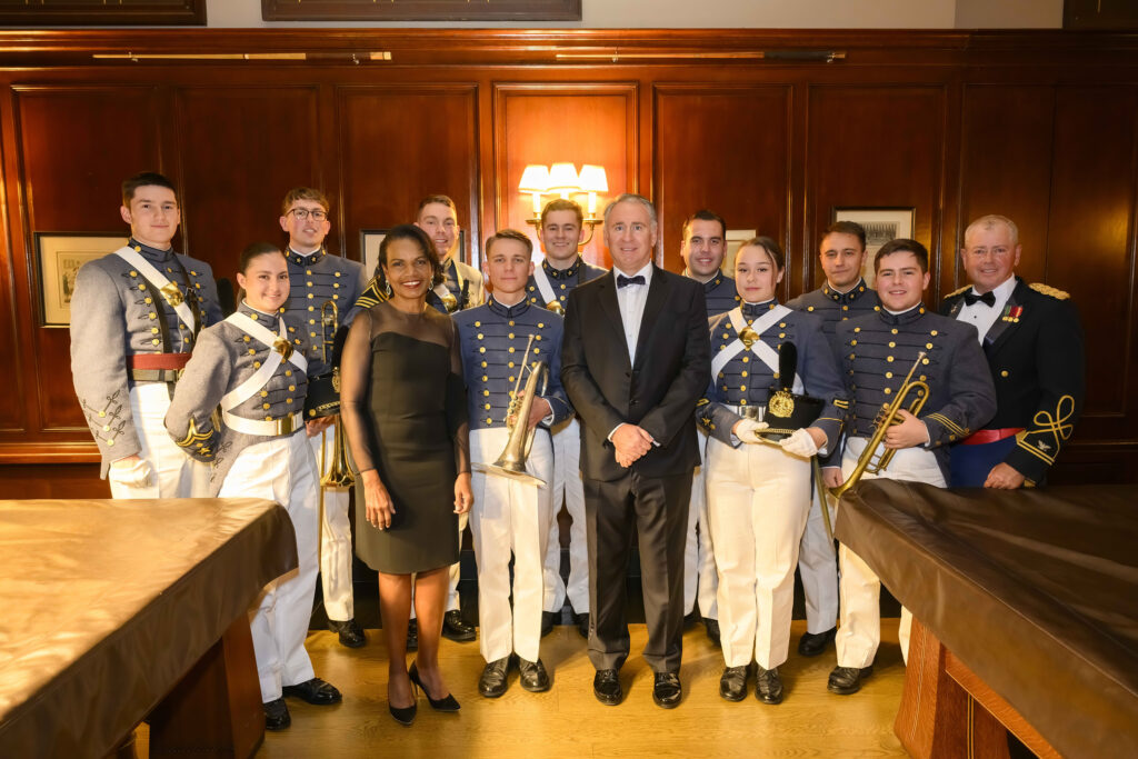 Dr. Condoleezza Rice, recipient of The George C. Marshall Foundation Award, and Kenneth C. Griffin, recipient of the George C. Marshall Foundation Humanitarian Award, flanked by members of the Institute Brass and Col. John Brodie, VMI music director.