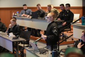 Hagen Stewart ’24 addresses the assembly during the NATO Innovation Hub “investment game simulation” in Scott Shipp Hall.