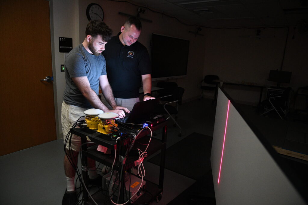 Bruce Hay ’25, a mechanical engineering major with a concentration in aerospace engineering, completed his 10-week Summer Undergraduate Research Institute (SURI) project by designing an off-road laser measurement mapping system to forewarn drivers of trail conditions.