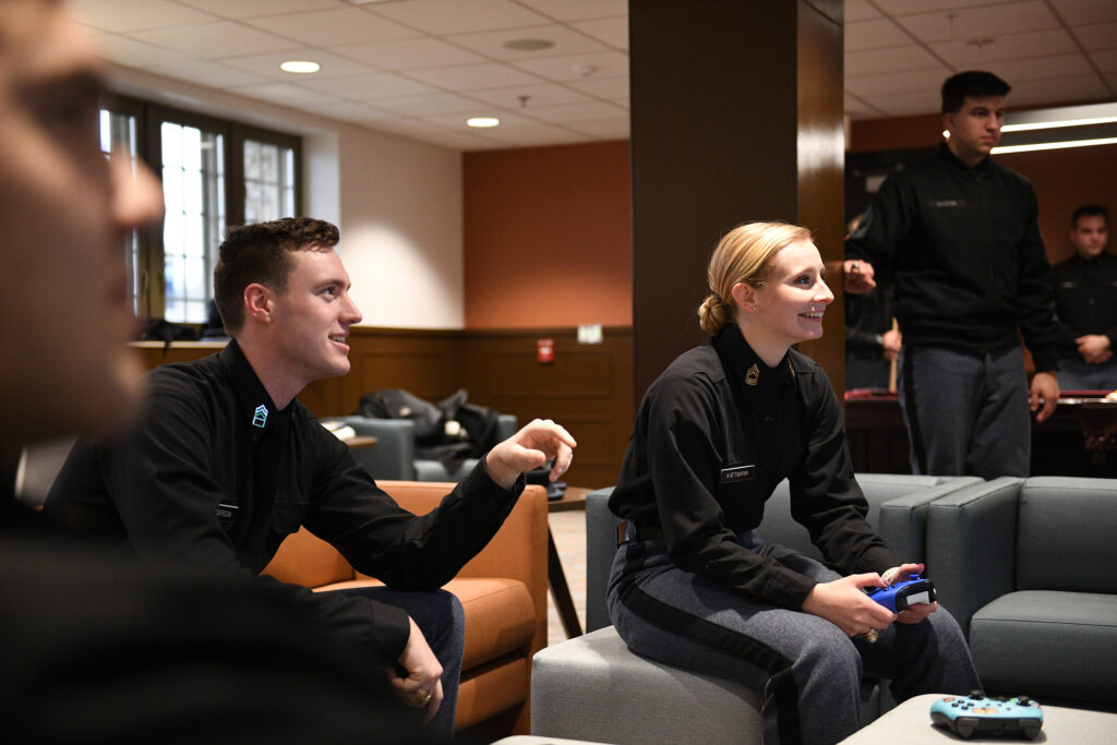 Cadets sit and play in the new Arsenal area at VMI.
