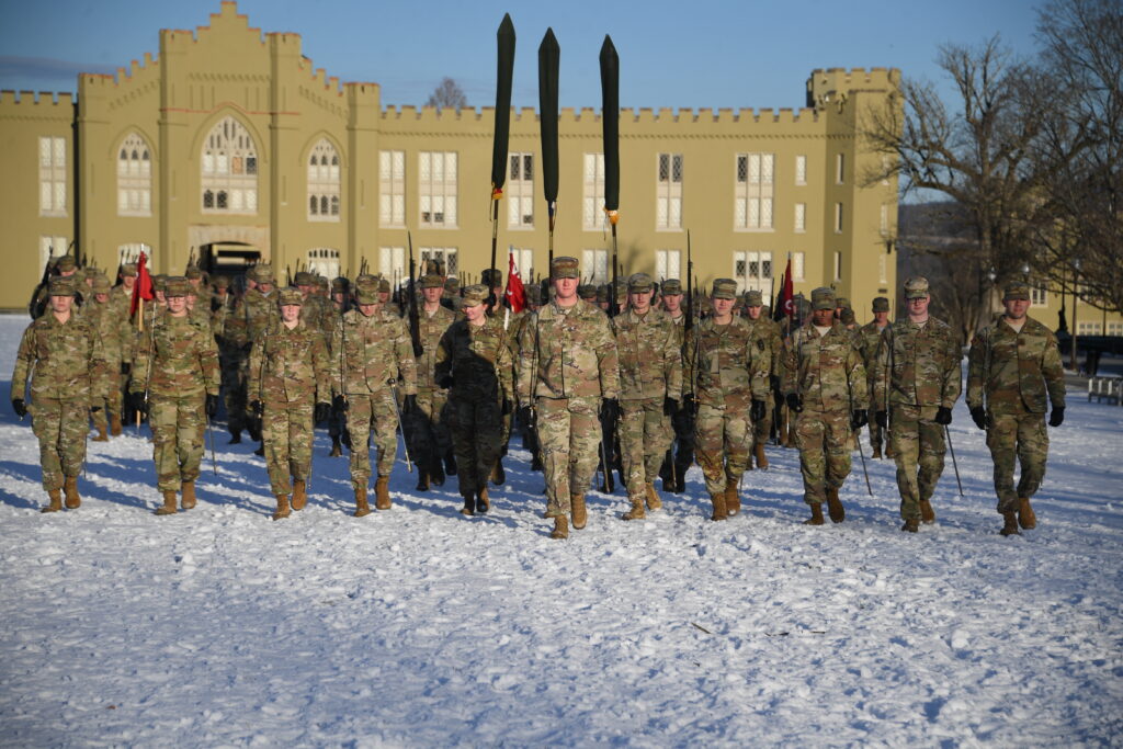 The Corps of Cadets march on the snow-covered Parade Ground.