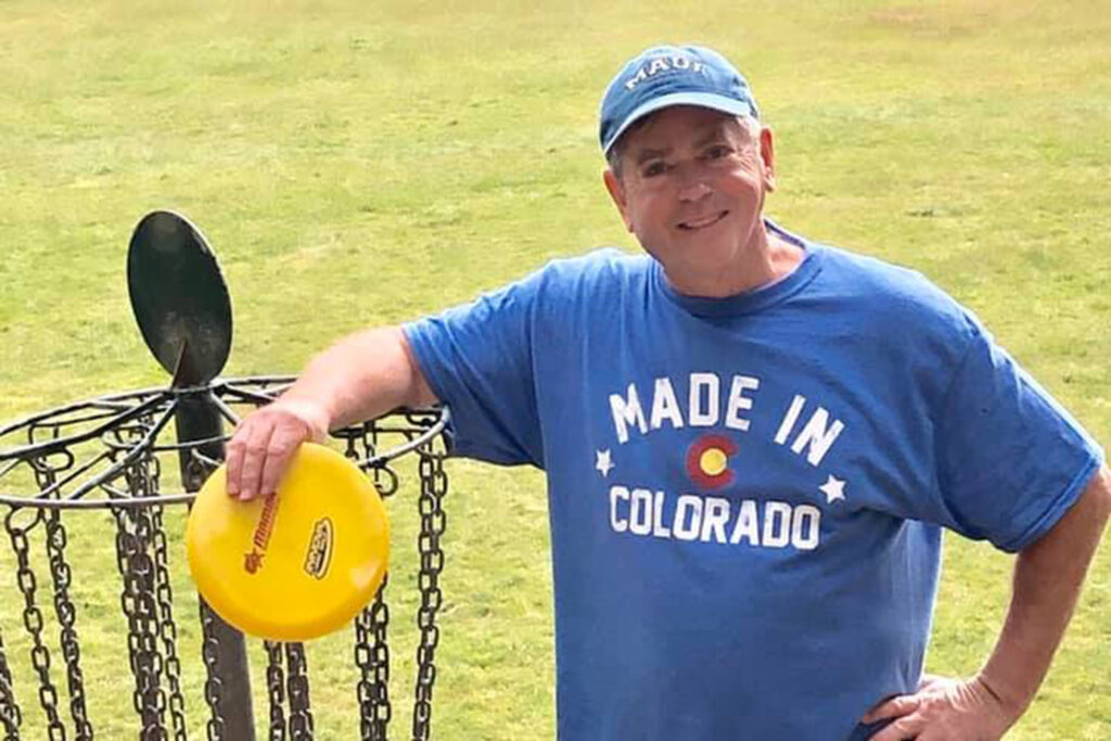 John Brodie, director of music at VMI, playing disc golf.