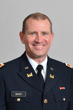 Col. Spencer D. Bakich, Ph.D.