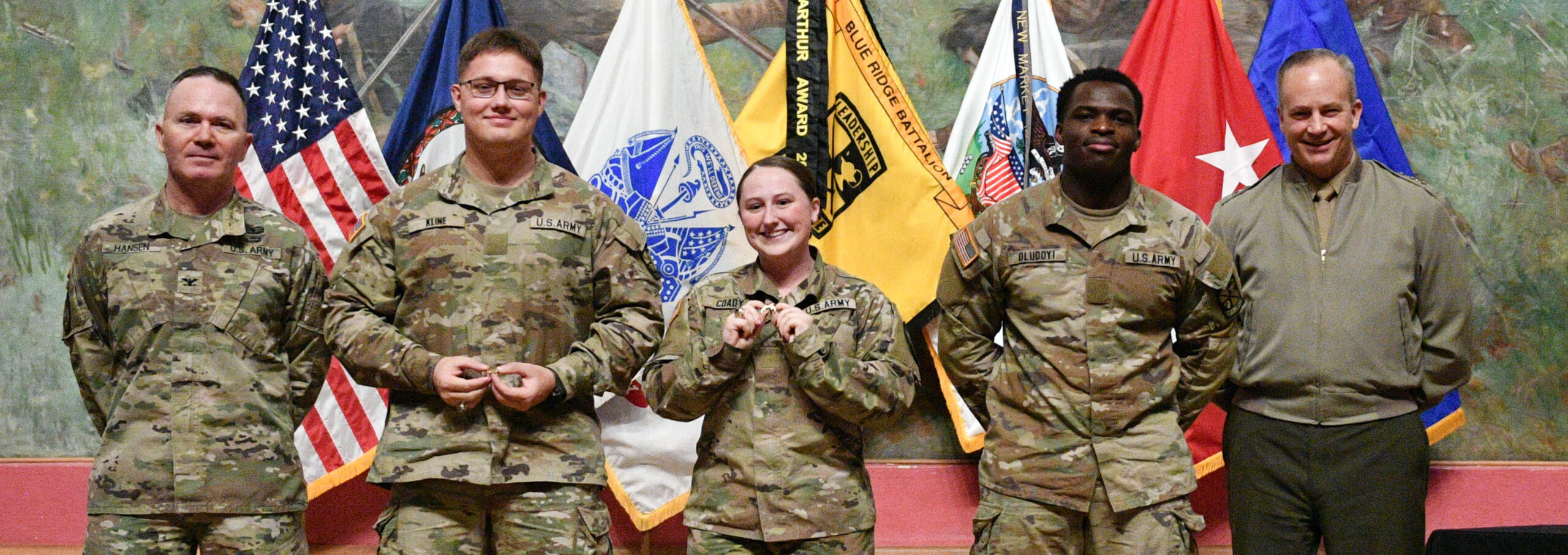 Cadets pose after receiving branch orders for the Army.