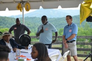 Eugene Williams ’74 speaks at reunion picnic in Collierstown July 11.