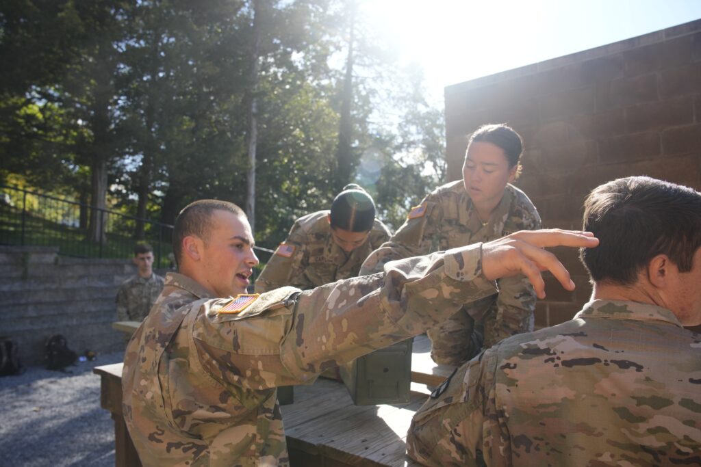 Air Force ROTC cadets work at VMI's Leadership Reaction Course to problem-solve as part of their team training.