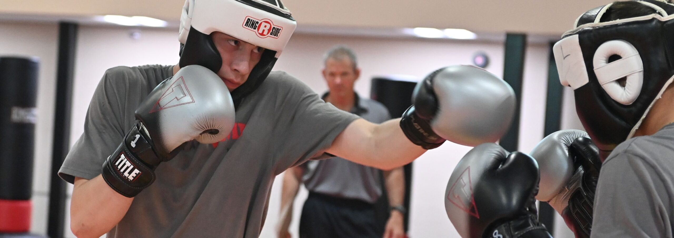 A cadet boxing for a Human and Performance Wellness class.