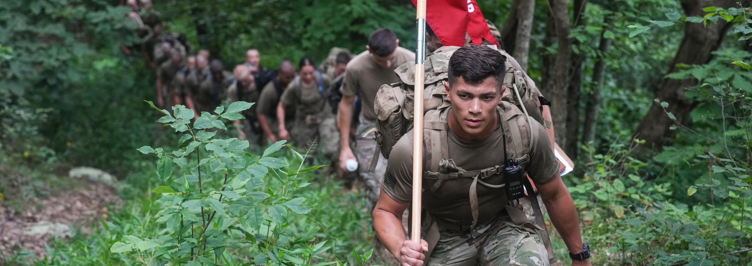 Cadet leader hikes at the front of a line of VMI freshmen up House Mountain as part of Matriculation Week.