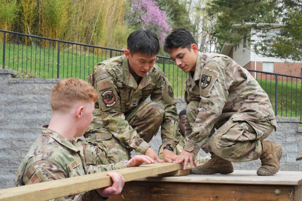 Air Force ROTC cadets work at VMI's Leadership Reaction Course to problem-solve as part of their team training.